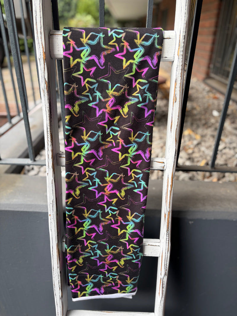 0,5m Modal Jersey Grungestars gelb türkis pink blau