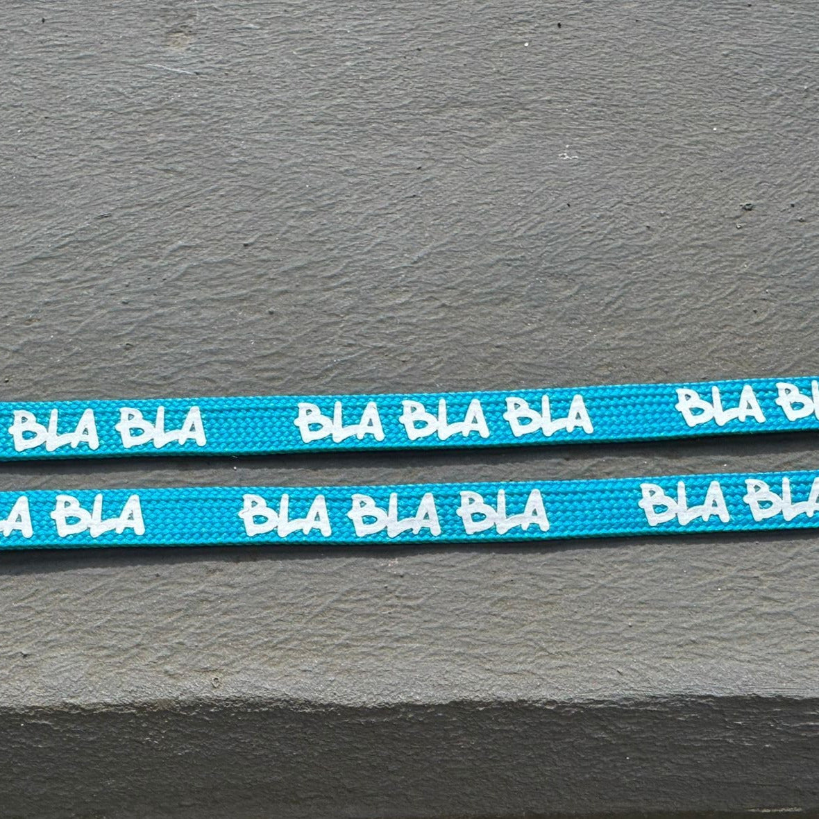 Flachkordel 1m "blablabla" türkis