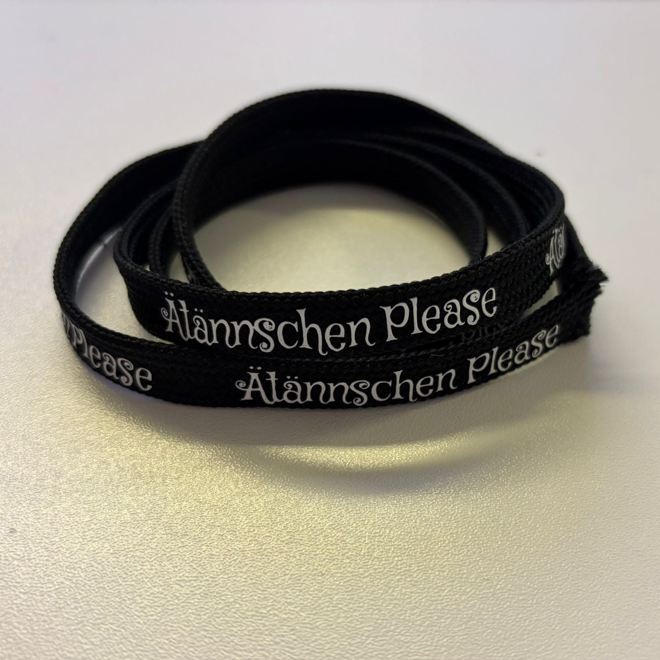 Flachkordel 1m "Ätännschen Please" schwarz