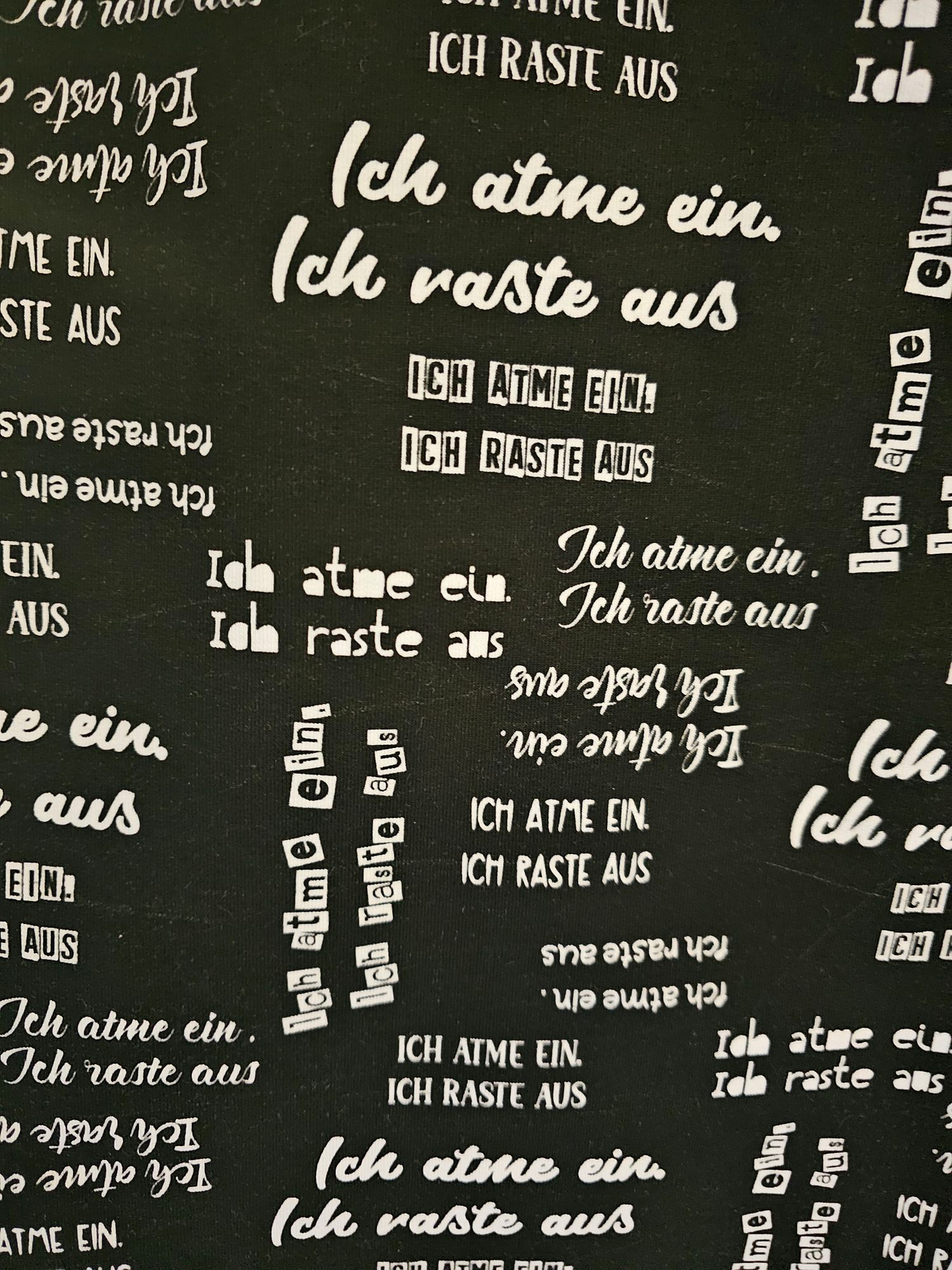 0,5m Bio-French Terry Ich atme ein ich raste aus schwarz weiß