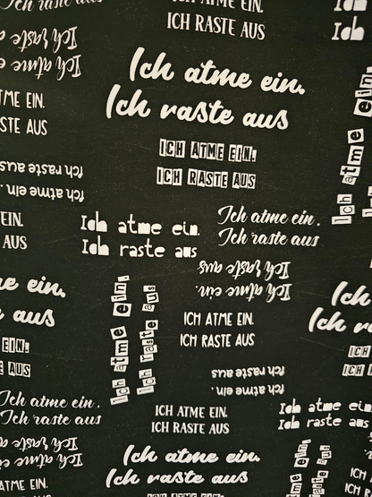 0,5m Bio-French Terry Ich atme ein ich raste aus schwarz weiß